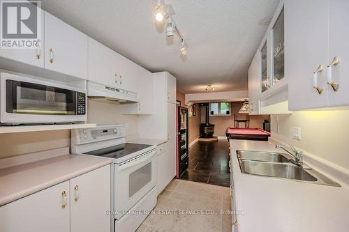 1457 Postmaster Drive, Oakville, ON - Indoor Photo Showing Kitchen With Double Sink