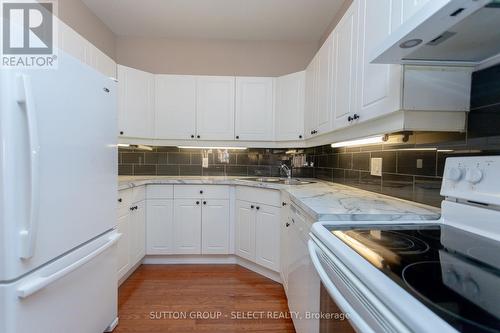 44 - 1555 Highbury Avenue N, London, ON - Indoor Photo Showing Kitchen With Double Sink