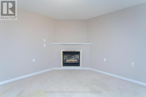 44 - 1555 Highbury Avenue N, London, ON - Indoor Photo Showing Living Room With Fireplace