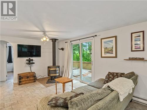 451 Murphy Road, Saint-Norbert, NB - Indoor Photo Showing Living Room With Fireplace