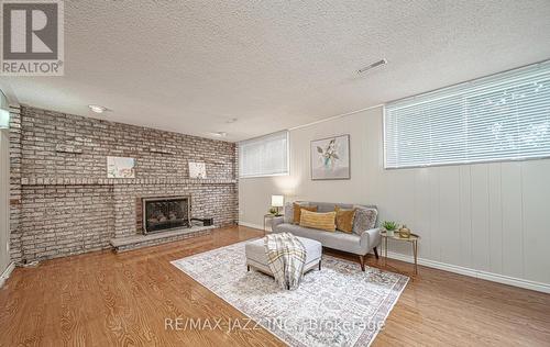 75 Tidworth Square, Toronto E07, ON - Indoor Photo Showing Living Room With Fireplace