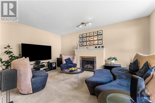 2 Knotwood Court, Ottawa, ON - Indoor Photo Showing Living Room With Fireplace