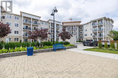 401 - 50 Lakebreeze Drive, Clarington (Newcastle), ON - Outdoor With Balcony With Facade