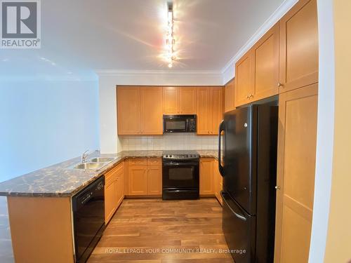 621 - 2855 Bloor Street W, Toronto (Stonegate-Queensway), ON - Indoor Photo Showing Kitchen With Double Sink