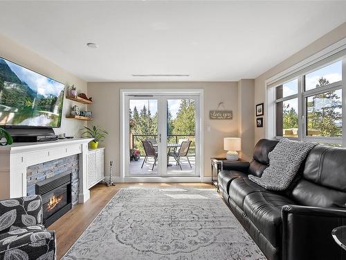 523-1400 Lynburne Pl, Langford, BC - Indoor Photo Showing Living Room With Fireplace