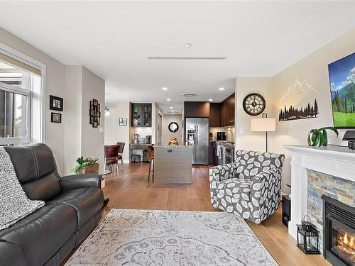 523-1400 Lynburne Pl, Langford, BC - Indoor Photo Showing Living Room With Fireplace