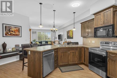 3739 Casorso Road Unit# 307, Kelowna, BC - Indoor Photo Showing Kitchen With Double Sink