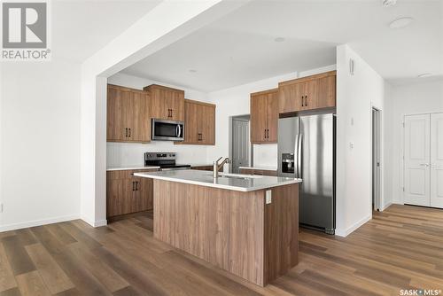 3285 Favel Drive, Regina, SK - Indoor Photo Showing Kitchen With Stainless Steel Kitchen