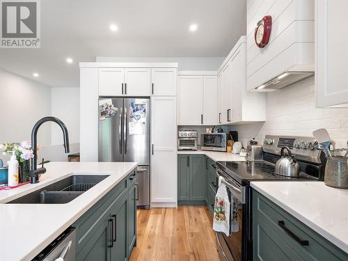 21 Preston Drive W, Enderby, BC - Indoor Photo Showing Kitchen With Double Sink With Upgraded Kitchen