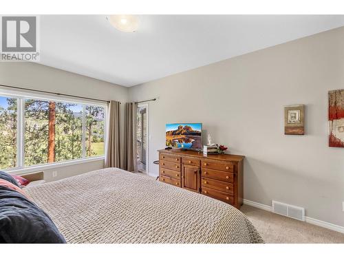 4520 Gallaghers Lookout Unit# 6, Kelowna, BC - Indoor Photo Showing Bedroom