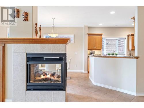 4520 Gallaghers Lookout Unit# 6, Kelowna, BC - Indoor Photo Showing Living Room With Fireplace