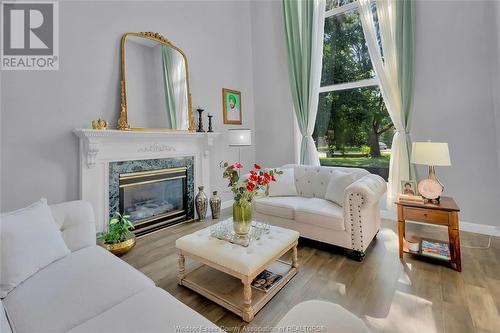 3928 Sixth Concession Road, Windsor, ON - Indoor Photo Showing Living Room With Fireplace