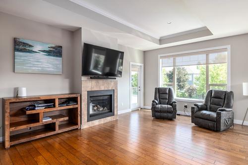 12870 Cliffshore Drive, Lake Country, BC - Indoor Photo Showing Living Room With Fireplace