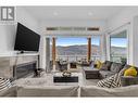 3514 Mckinley Beach Drive, Kelowna, BC  - Indoor Photo Showing Living Room With Fireplace 