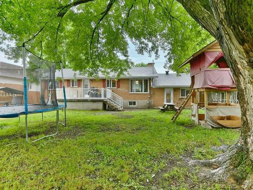 Back facade - 276 Rue Cartier, Repentigny (Le Gardeur), QC - Outdoor With Deck Patio Veranda