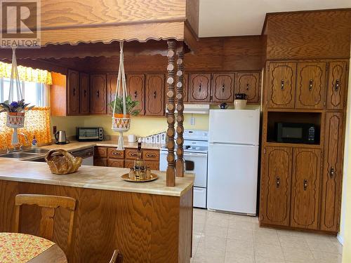 83 West Street, Stephenville, NL - Indoor Photo Showing Kitchen With Double Sink