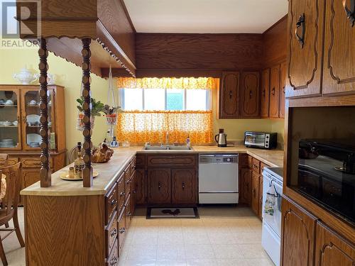 83 West Street, Stephenville, NL - Indoor Photo Showing Kitchen With Double Sink