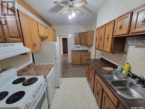 202 Irvine Street, Cut Knife, SK - Indoor Photo Showing Kitchen With Double Sink