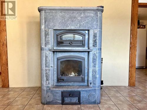 5790 Timothy Lake Road, Lac La Hache, BC - Indoor Photo Showing Living Room With Fireplace