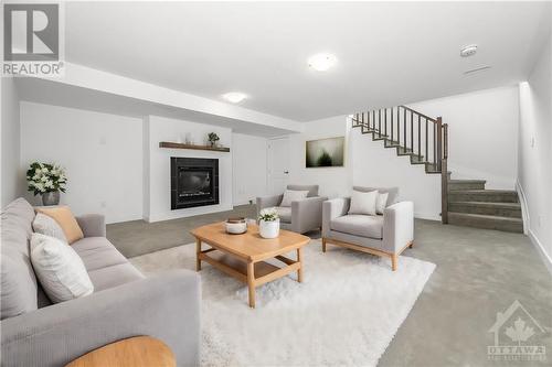 Virtually Staged - 2325 Goldhawk Drive, Ottawa, ON - Indoor Photo Showing Living Room With Fireplace