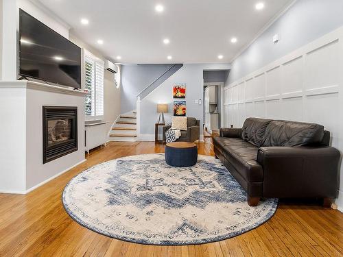 Salon - 48 Av. Hillcrest, Montréal (Lachine), QC - Indoor Photo Showing Living Room With Fireplace