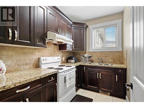 1429 Black Mountain Crescent, Kelowna, BC - Indoor Photo Showing Kitchen With Double Sink