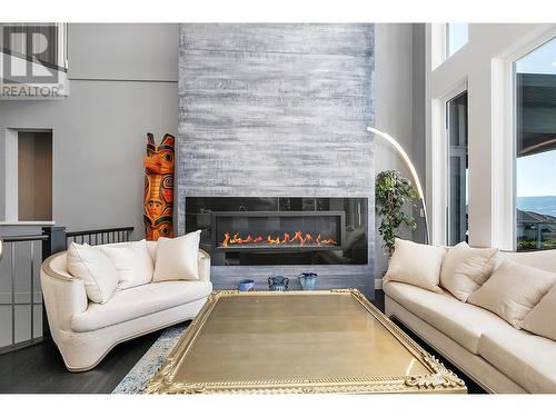 440 Audubon Court, Kelowna, BC - Indoor Photo Showing Living Room With Fireplace