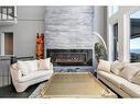 440 Audubon Court, Kelowna, BC  - Indoor Photo Showing Living Room With Fireplace 