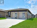 Double garage with concrete driveway - 360 Mary Rose Avenue, Port Elgin, ON  - Outdoor 