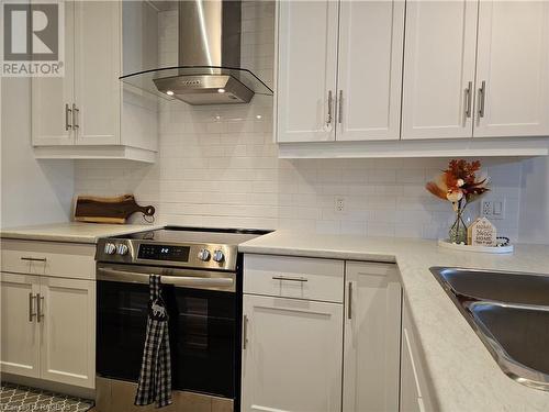 Functional kitchen with stainless appliances - 360 Mary Rose Avenue, Port Elgin, ON - Indoor Photo Showing Kitchen With Double Sink With Upgraded Kitchen