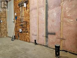 Rough-in for a third bathroom in the basement with an access door to the garage - allows for separate entrance - 