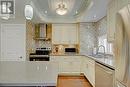 340 Jones Avenue, Toronto (Blake-Jones), ON  - Indoor Photo Showing Kitchen With Double Sink 