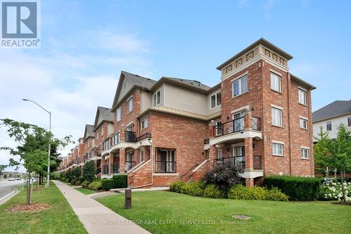 19 - 2551 Sixth Line, Oakville (River Oaks), ON - Outdoor With Balcony With Facade