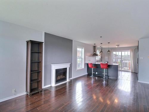 Overall view - 155 Rue Chabot, Val-D'Or, QC - Indoor Photo Showing Living Room With Fireplace