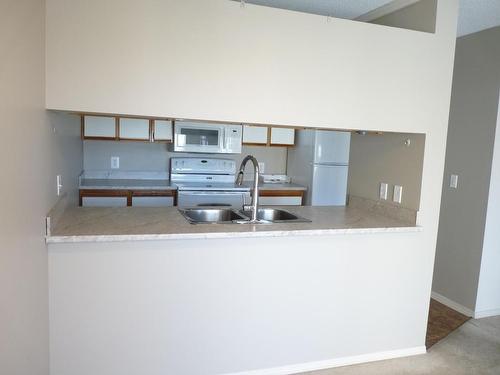 310-338 Nicola Street, Kamloops, BC - Indoor Photo Showing Kitchen With Double Sink