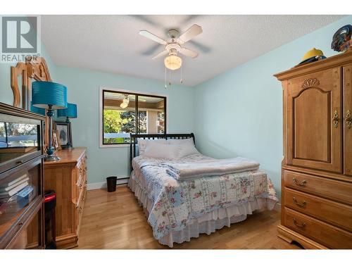 1035 Bernard Avenue Unit# 114, Kelowna, BC - Indoor Photo Showing Bedroom