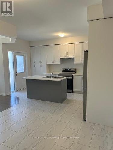 15 Federica Crescent, Wasaga Beach, ON - Indoor Photo Showing Kitchen With Double Sink