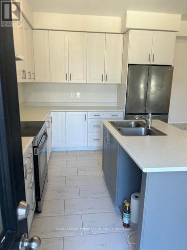 15 Federica Crescent, Wasaga Beach, ON - Indoor Photo Showing Kitchen With Double Sink