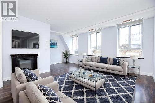 504 - 135 Maitland Street, Toronto (Church-Yonge Corridor), ON - Indoor Photo Showing Living Room With Fireplace