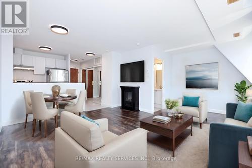 504 - 135 Maitland Street, Toronto (Church-Yonge Corridor), ON - Indoor Photo Showing Living Room With Fireplace