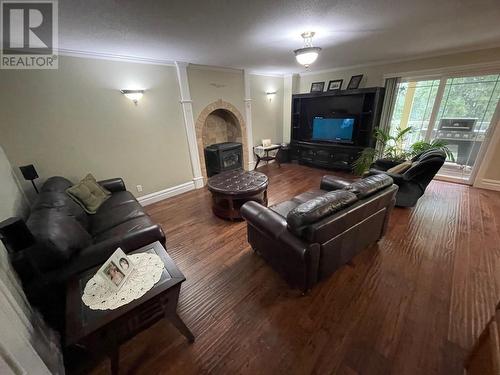 94 Chase Road, Christina Lake, BC - Indoor Photo Showing Living Room With Fireplace