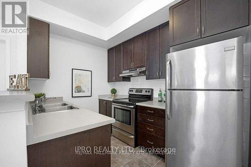 111 - 2891 Rio Court, Mississauga (Central Erin Mills), ON - Indoor Photo Showing Kitchen With Double Sink