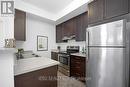 111 - 2891 Rio Court, Mississauga (Central Erin Mills), ON  - Indoor Photo Showing Kitchen With Double Sink 