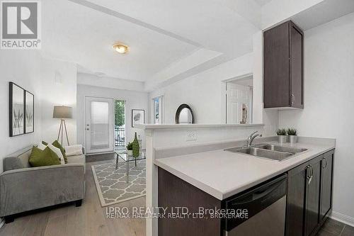 111 - 2891 Rio Court, Mississauga (Central Erin Mills), ON - Indoor Photo Showing Kitchen With Double Sink