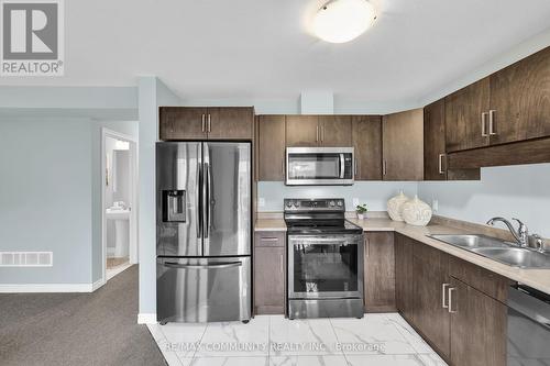 75 Heron Street, Welland, ON - Indoor Photo Showing Kitchen With Double Sink