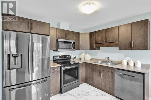 75 Heron Street, Welland, ON - Indoor Photo Showing Kitchen With Double Sink