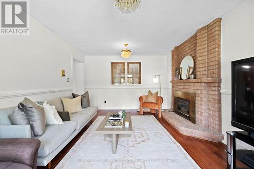 39 Lord Sydenham Court, Toronto (L'Amoreaux), ON - Indoor Photo Showing Living Room With Fireplace