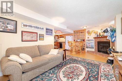 59 - 1200 Walden Circle, Mississauga (Clarkson), ON - Indoor Photo Showing Living Room With Fireplace