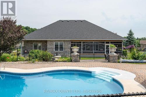 107 Country Charm Drive, Belleville, ON - Outdoor With In Ground Pool