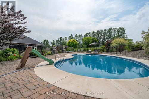 107 Country Charm Drive, Belleville, ON - Outdoor With In Ground Pool With Backyard